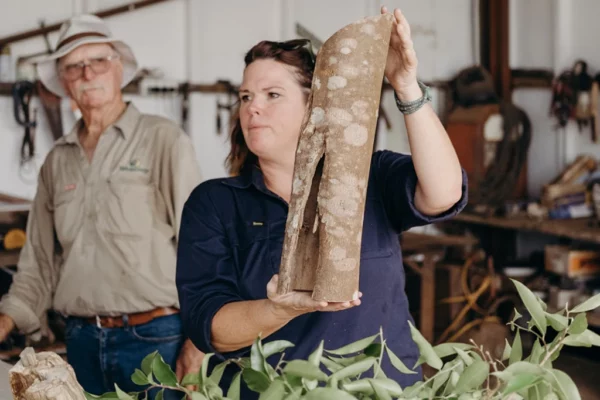 Wescorp farmers Tim and Fleur Coakley with Agarwood, a prized perfume ingredient grown in Queensland.